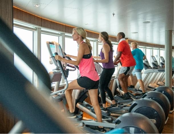 People exercising in the Fitness Center on board Holland America ship