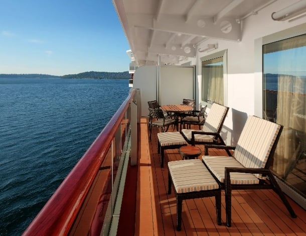 A view of the balcony outside a room on a ship.